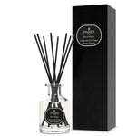 Parks diffuser bottle with black reeds and black box on a white background