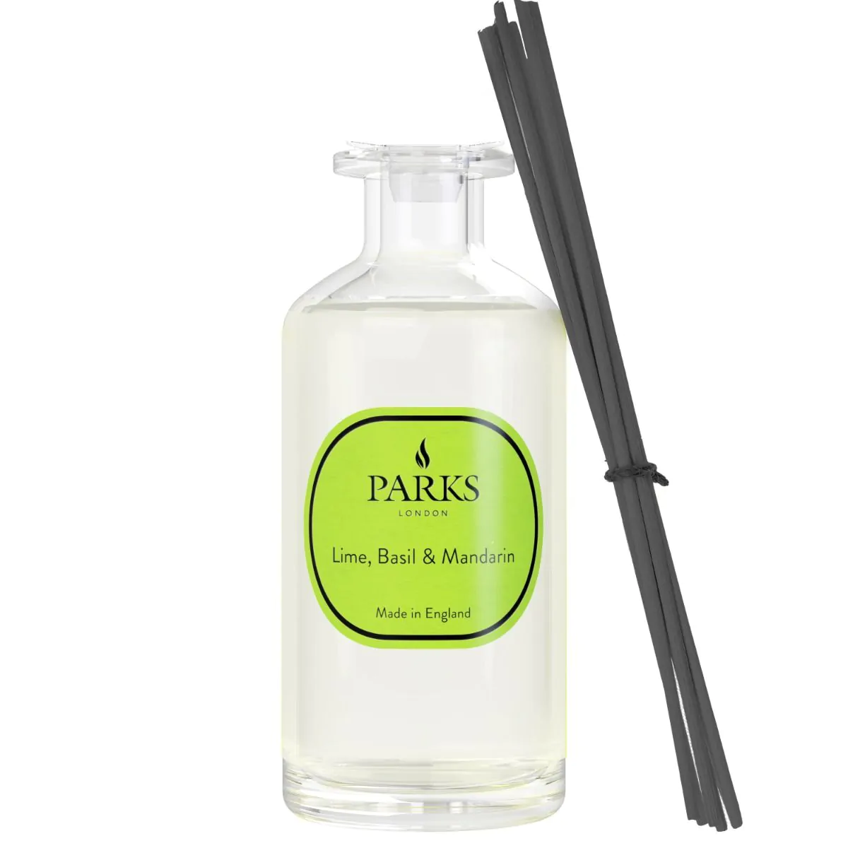 A clear glass diffuser bottle with a green label reading 'PARKS', 'Lime, Basil & Mandarin', and 'Made in England', alongside black reeds for the fragrance.