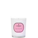 A white Parks branded candle with a pink label that reads 'Rose & Patchouli'. The candle is in an elegant glass vessel and indicates a 180g weight.