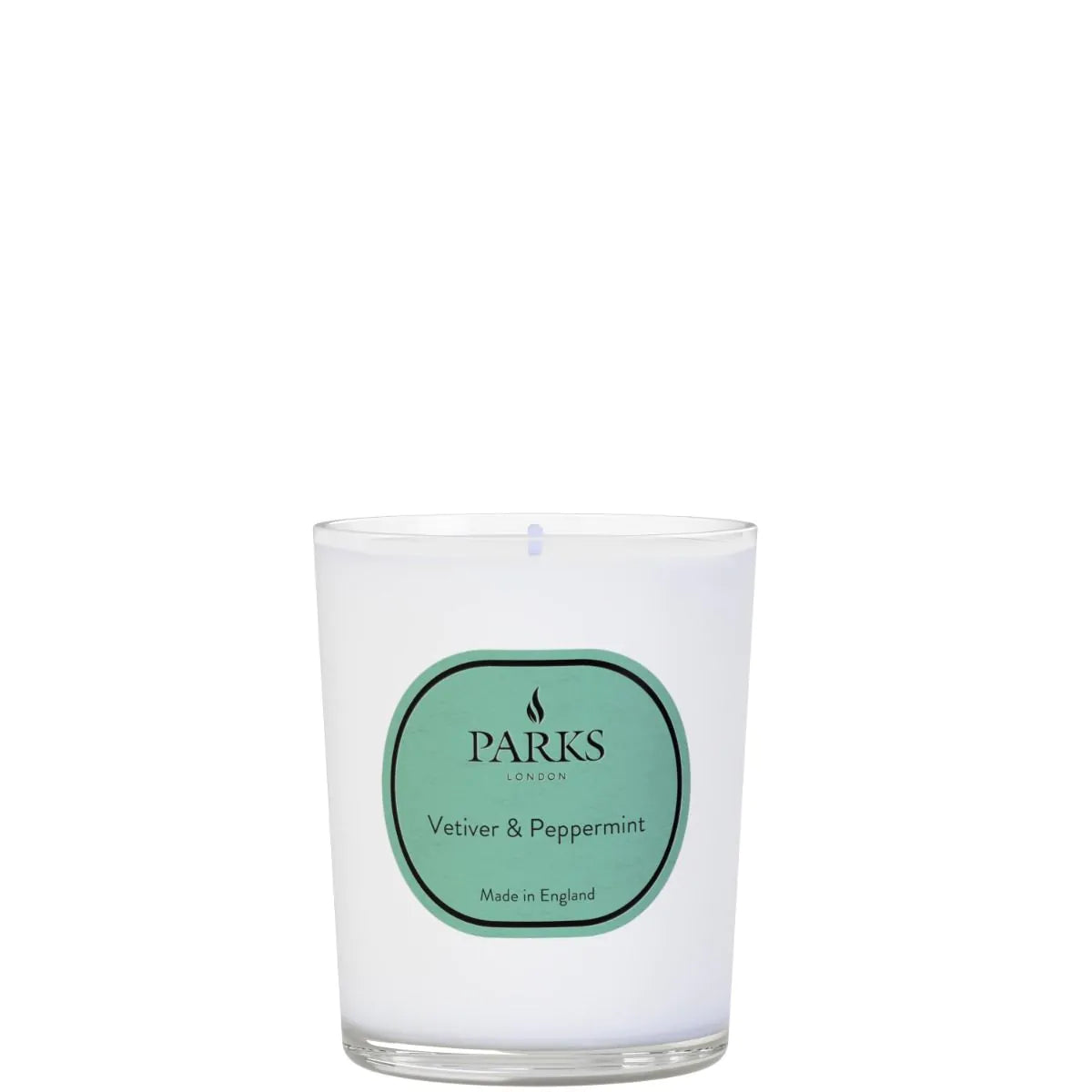 A white candle with a label that reads 'PARKS Vetiver & Peppermint', indicating the fragrance of the candle.