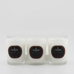 Three candles with 'Parks' labels on a white background