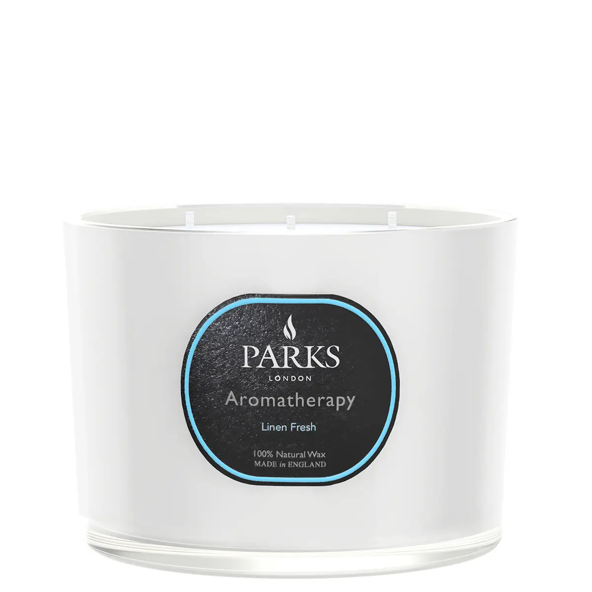 A white, 3-wick candle with a label that reads 'PARKS Aromatherapy Linen Fresh', indicating it is a scented candle with natural wax.