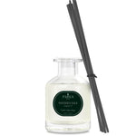 Parks fragrance diffuser bottle with black reeds on a white background