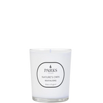 A white tumbler candle with a label that reads 'PARKS Nature's Own Revitalising', indicating the fragrance family as citrus and a burn time of 48 hours.