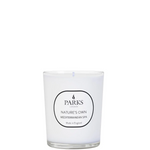 A white candle with a label that reads 'PARKS Nature's Own Mediterranean Spa', indicating it is made in England.