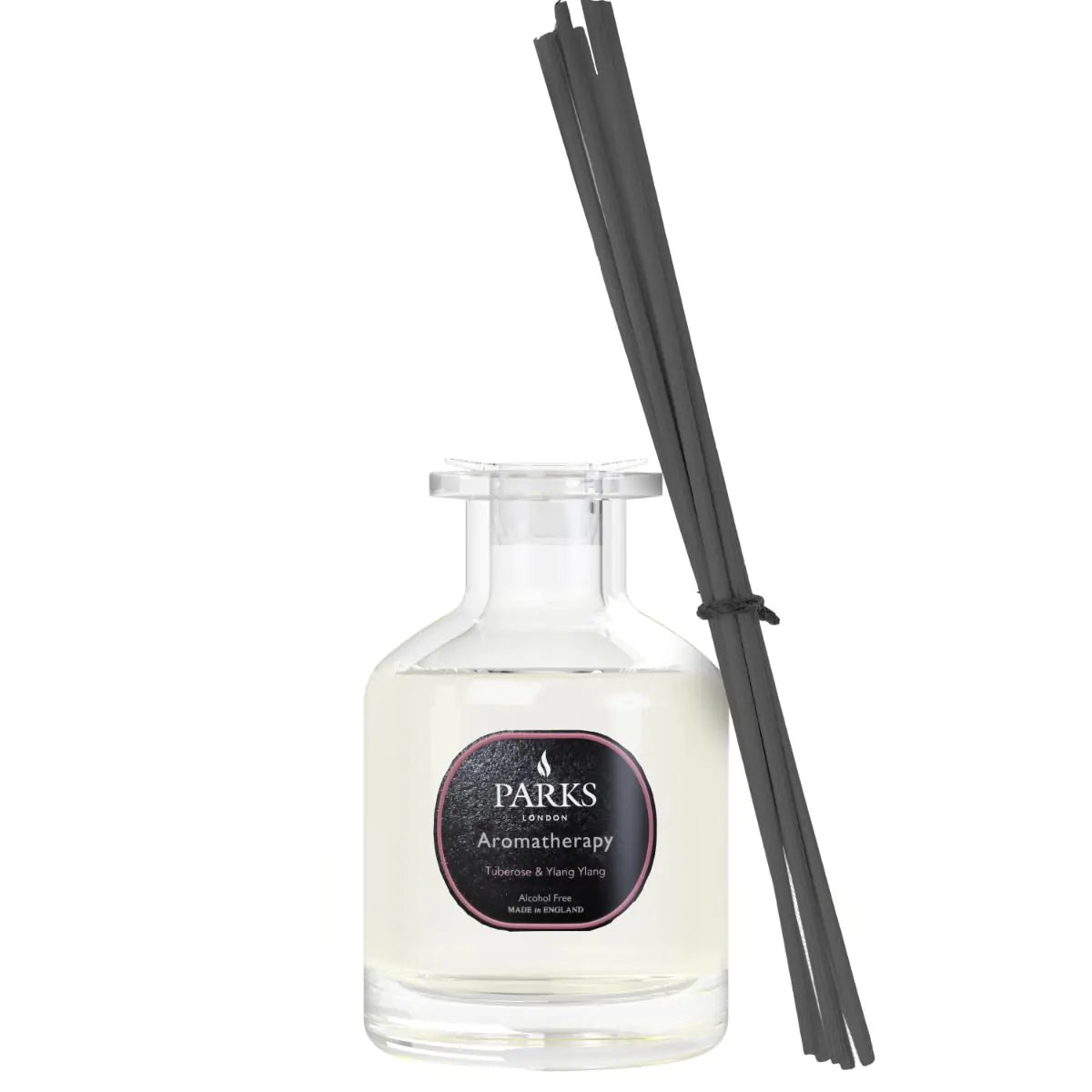 A clear glass diffuser bottle with black reeds, labeled 'PARKS Aromatherapy', containing a yellowish liquid.
